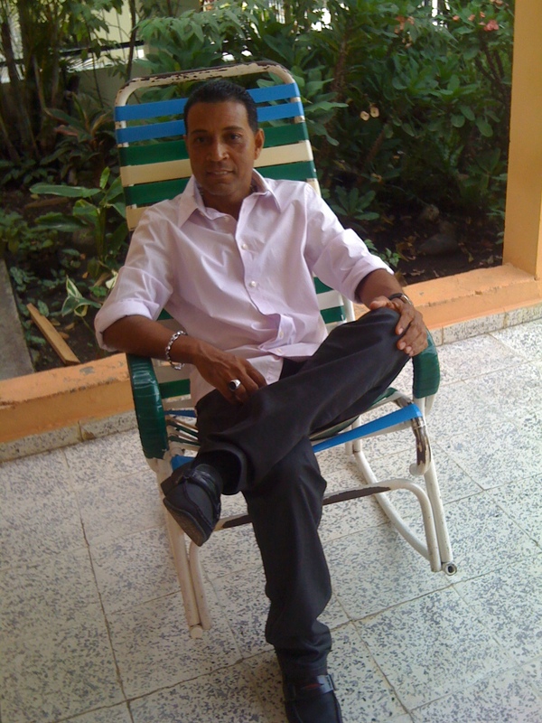 Date this happy Dominican Republic man Neno from Santo Domingo DO7846